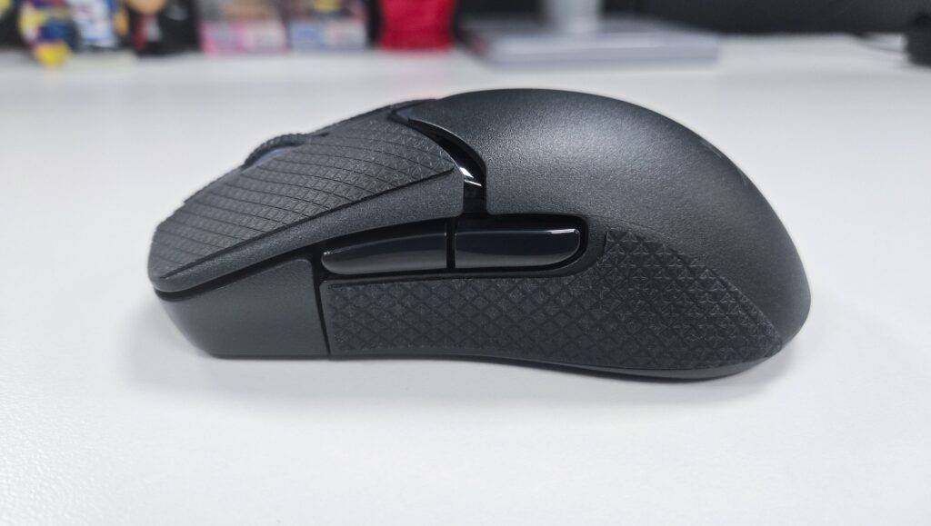 HyperX Pulsefire Saga Pro with textured grips attached