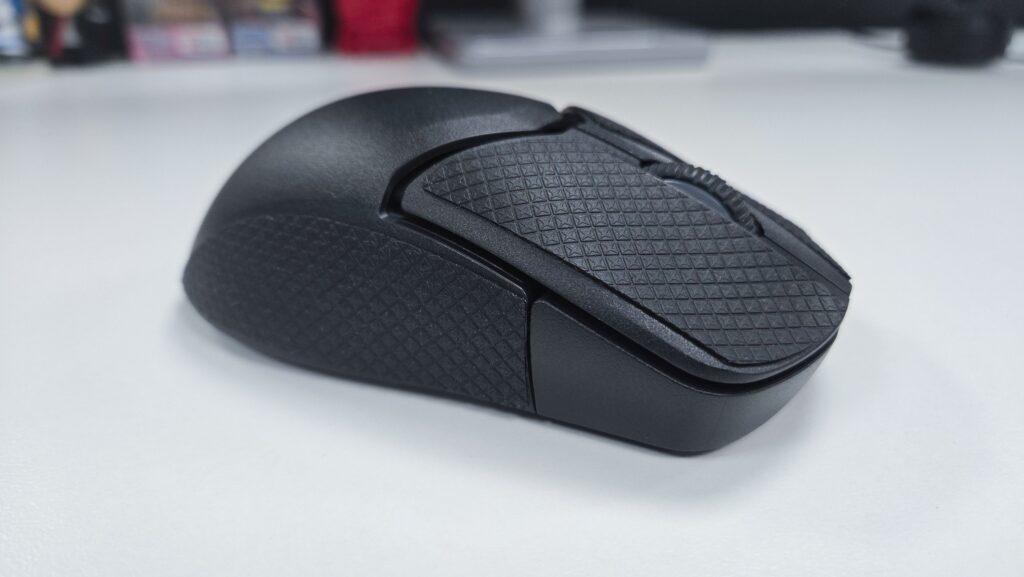HyperX Pulsefire Saga Pro with textured grips attached
