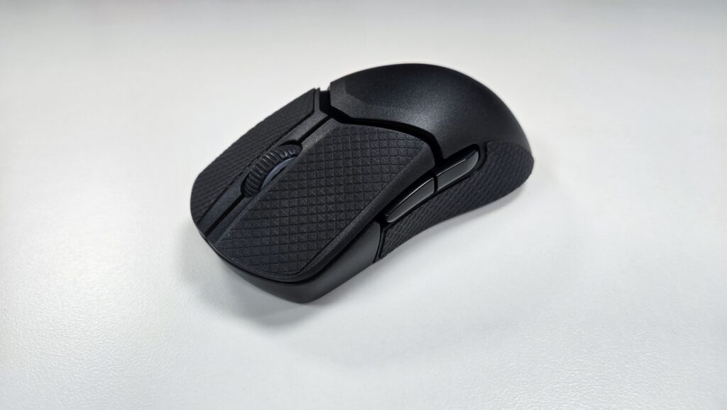 HyperX Pulsefire Saga Pro with textured grips attached